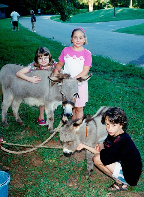 kids with miniature donkeys