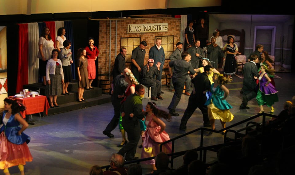 cast dancing on stage