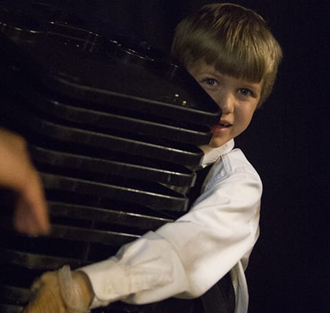 child with trays